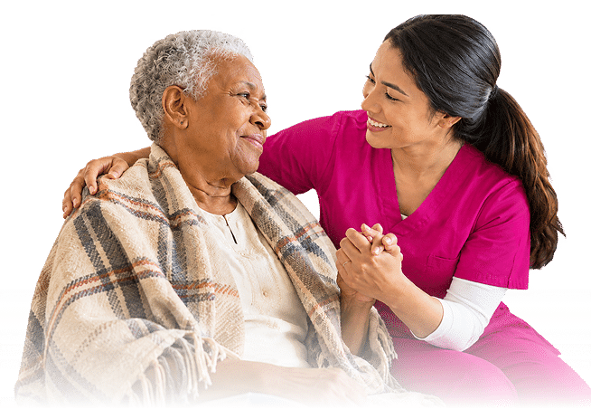 Compassionate Hospice Care Centered Around Patients Hospice caregiver comforting an elderly patient while providing dignity, respect, and personalized support